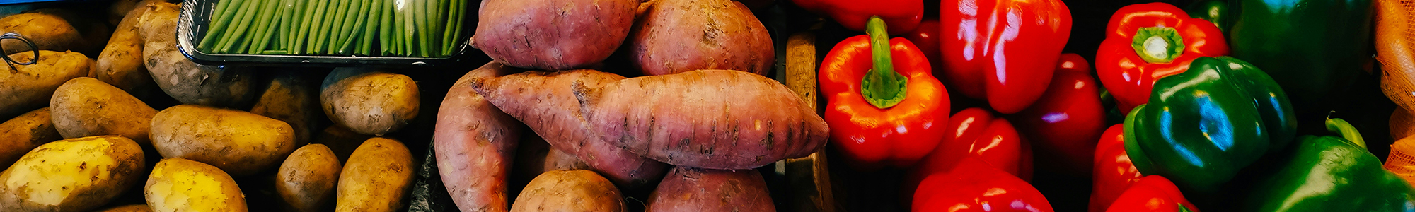 Boxes of fresh fruit and vegetables in a greengrocer